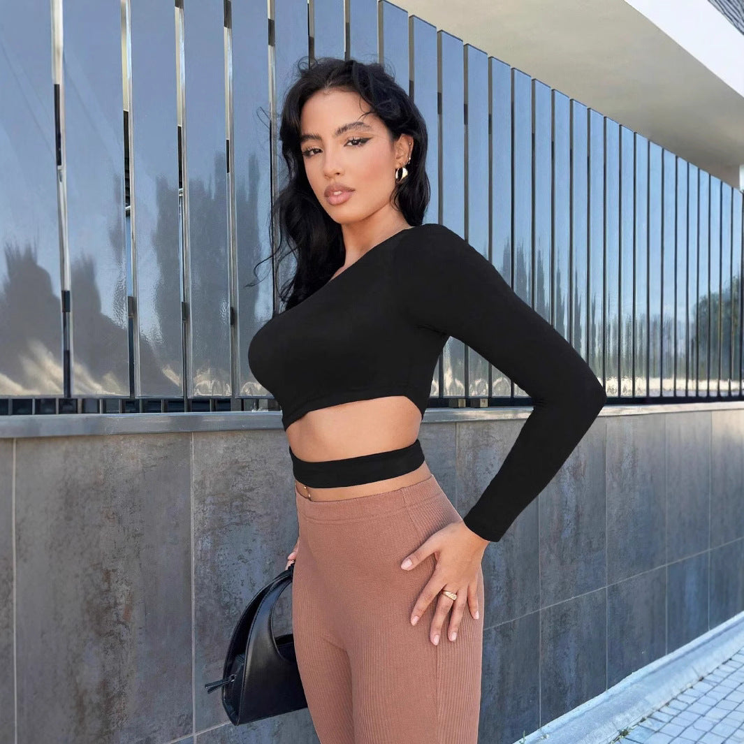 Asymmetrical cropped women's top with one long sleeve Chic & Stil