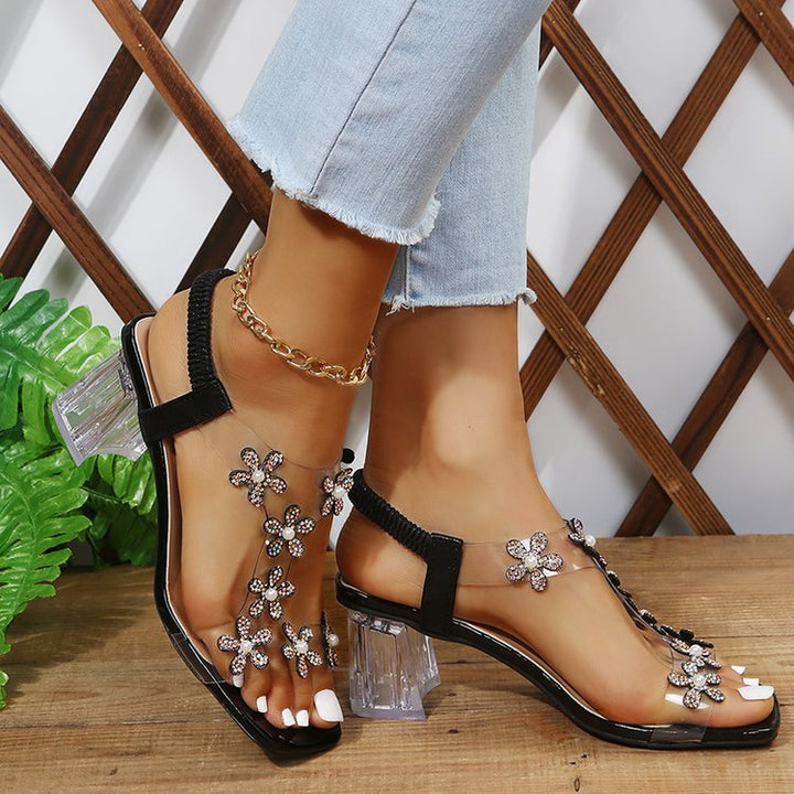 Elegant ladies sandals with floral appliqués and transparent heel Lune London