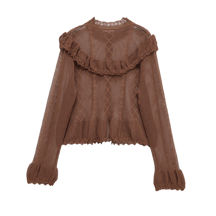 Ladies soft knit top with ruffle details and button placket Lune London