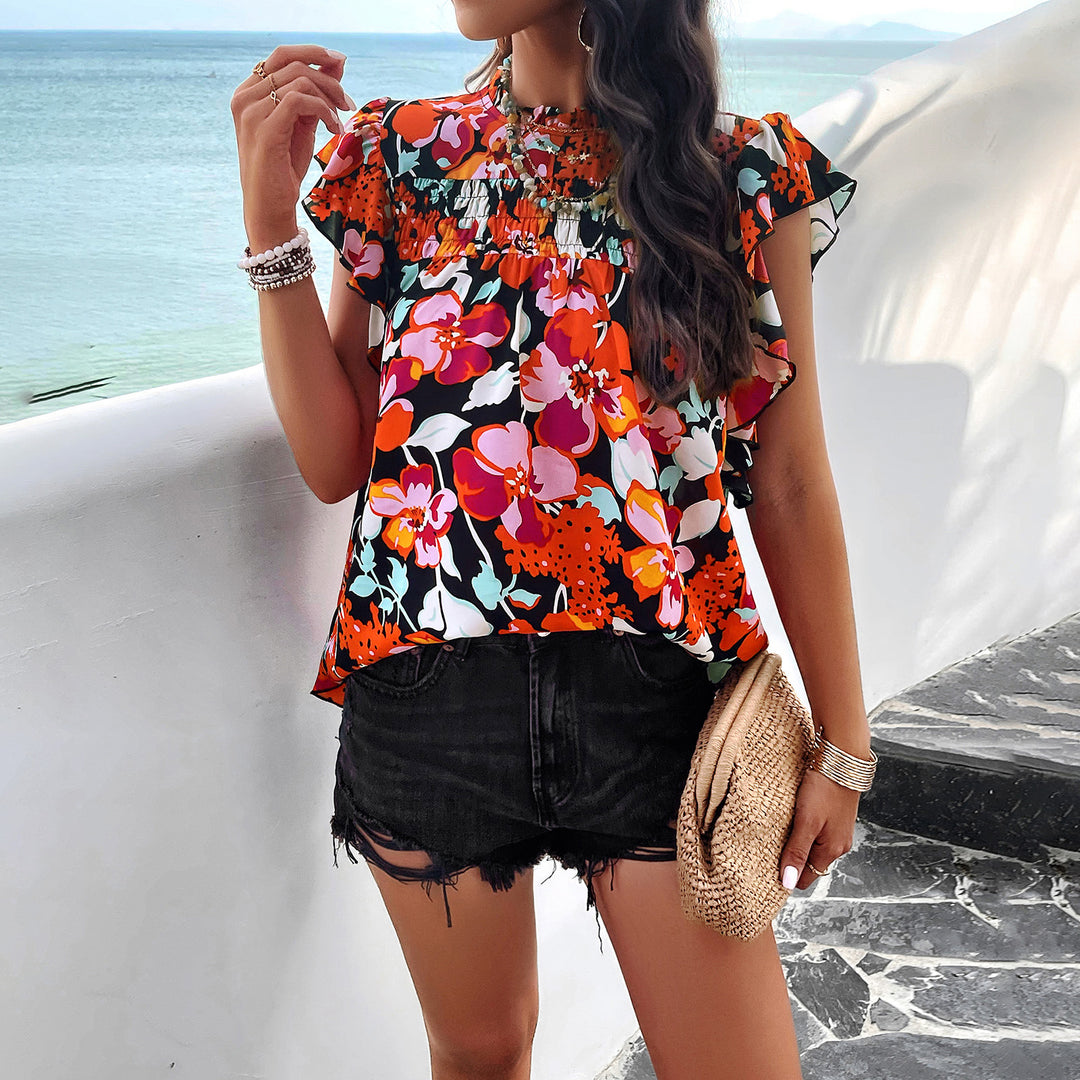 Women's blouse with ruffled details and floral patterns Lune London