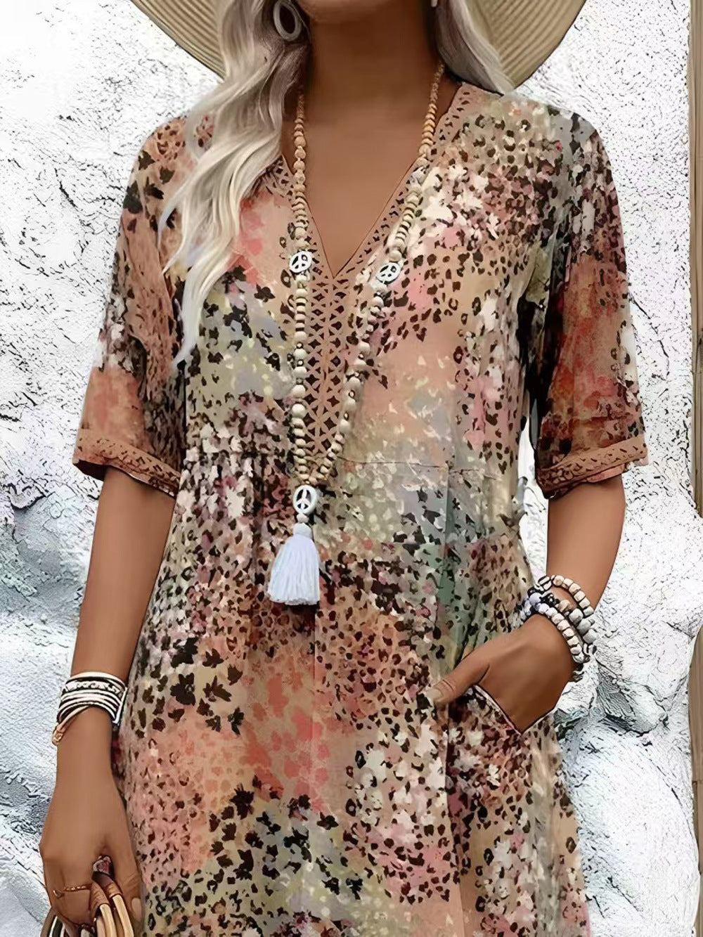 Maxi dress for women with V-neckline and practical side pockets Lune London