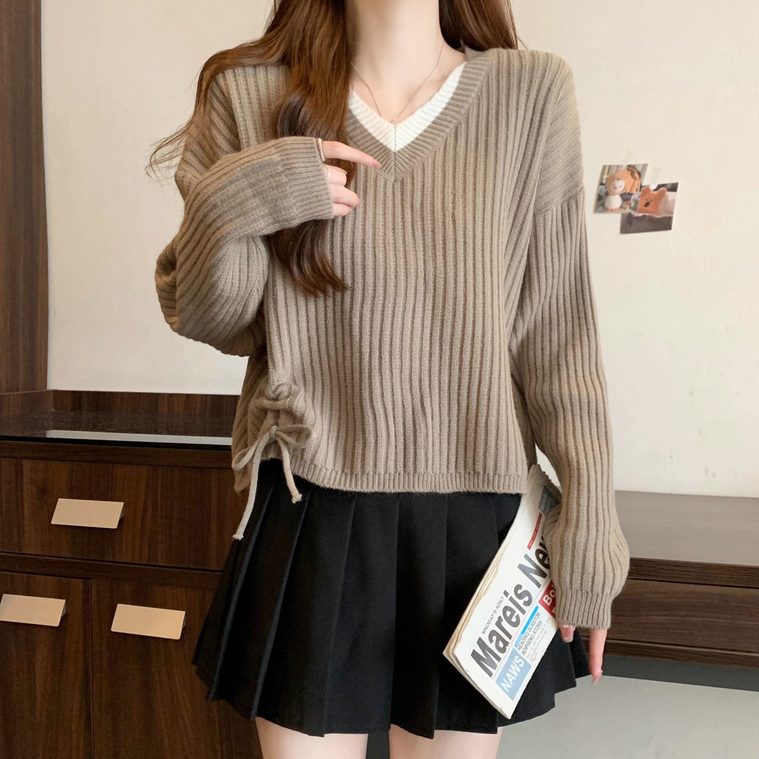 Condescending V-neck sweater for women with ribbed texture and trendy side ties Lune London