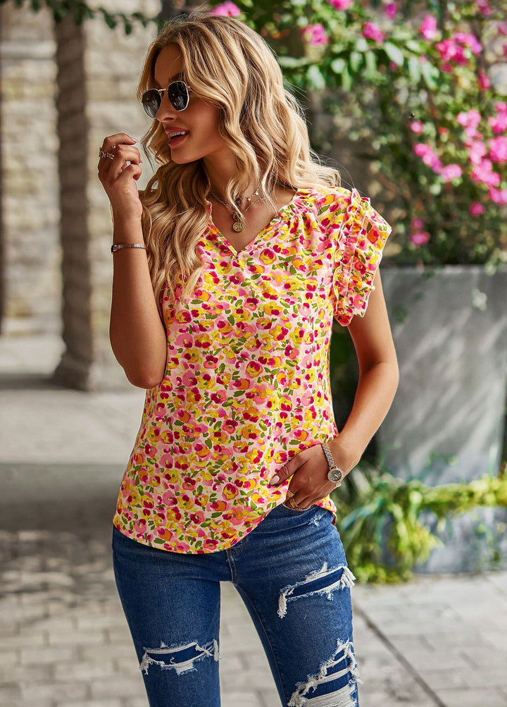 Women's blouse with ruffle details and sophisticated marbled pattern Lune London