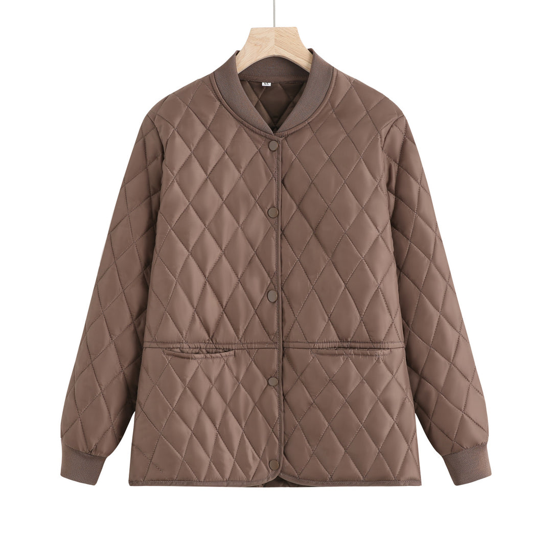 Women's quilted transition jacket with practical pockets and elastic cuffs Lune London