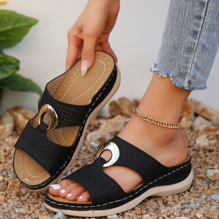 Women Sabot with perforations and decorative buckle Lune London