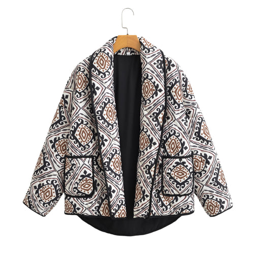 Veste matelassée élégante pour femmes avec ceinture à la taille et manches larges Chic & Stil