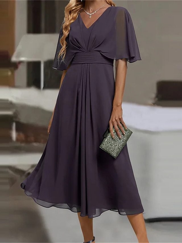 Elegant midi dress for women in flowing fabric with asymmetrical sleeves Lune London