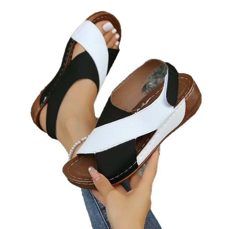 Elegant ladies sandals with decorative crossover straps and comfortable sole Lune London