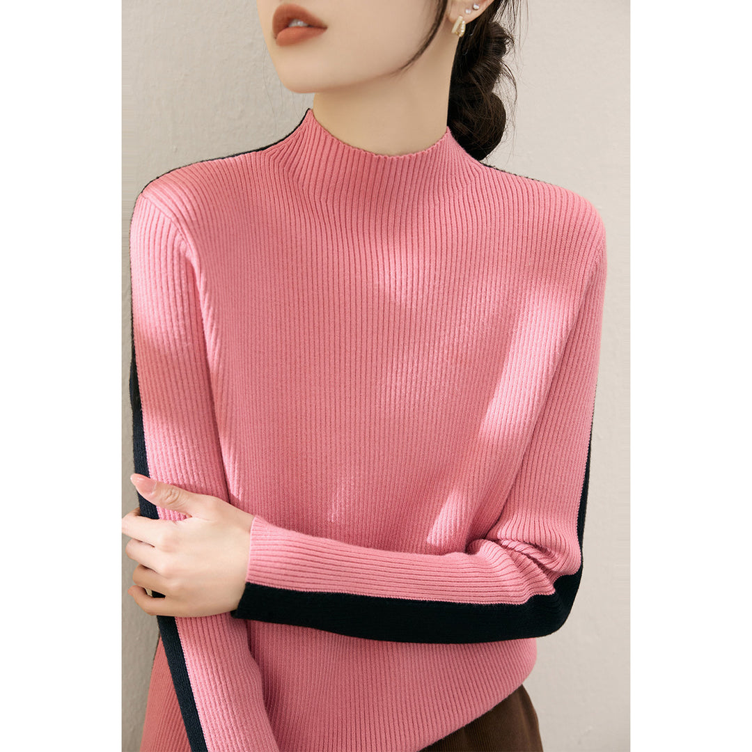 Pull à col roulé tendance pour femmes avec design en côtes texturées et manches contrastantes Chic & Stil