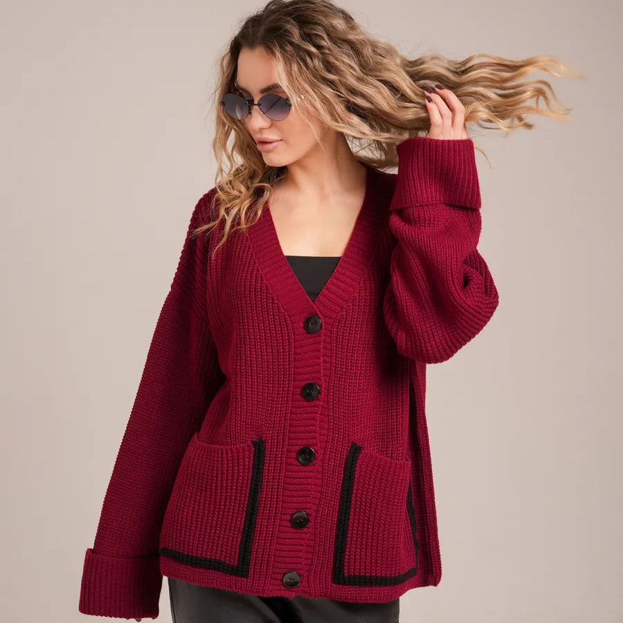 Ladies chunky knit cardigan with pockets and stylish contrasting details Lune London
