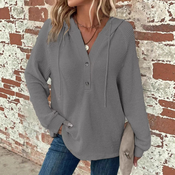 Top décontracté à manches longues pour femmes avec capuche et patte de boutonnage Chic & Stil