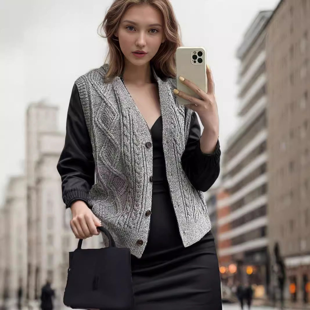Women's knitted jacket with a modern cable pattern and chic elegant buttons.