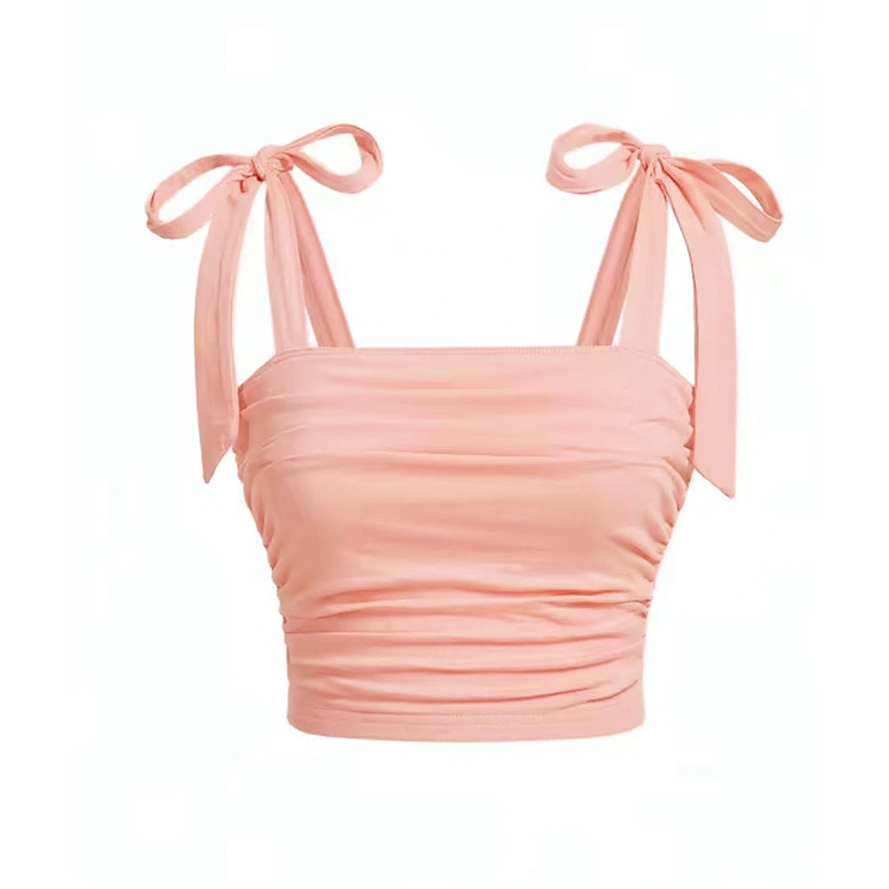 Short top for women with adjustable tie straps and ruffle details on the sides Chic & Stil
