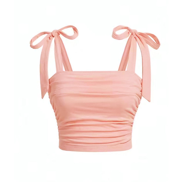 Short top for women with adjustable tie straps and ruffle details on the sides Chic & Stil
