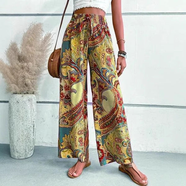 Wide Palazzo pants for women with paisley floral pattern and elastic waist Lune London