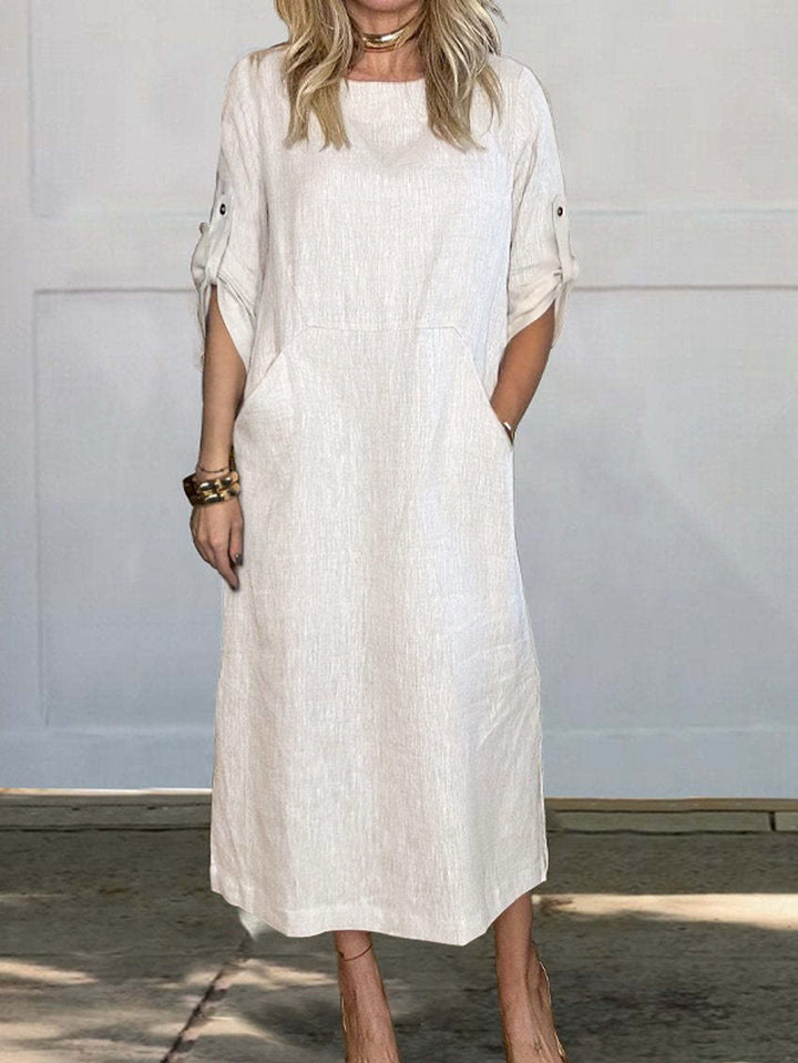 Airy midi dress for women with practical pockets and roll-up sleeves Lune London