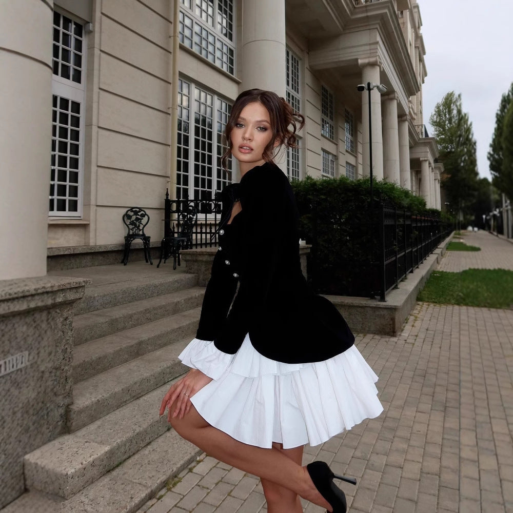 Party dress for ladies with an elegant design in black and white and a ruffle finish Lune London