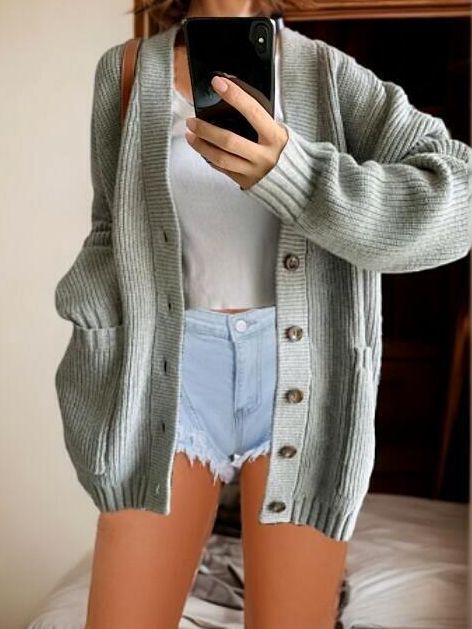 Women cardigan with decorative buttons and practical pockets Lune London