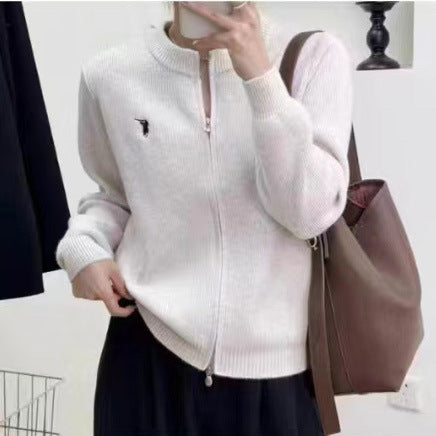 Ladies chunky knit cardigan with full zip closure and decorative details Lune London