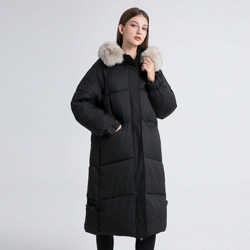 Long winter coat for women lined with removable faux fur collar and practical drawstrings Lune London