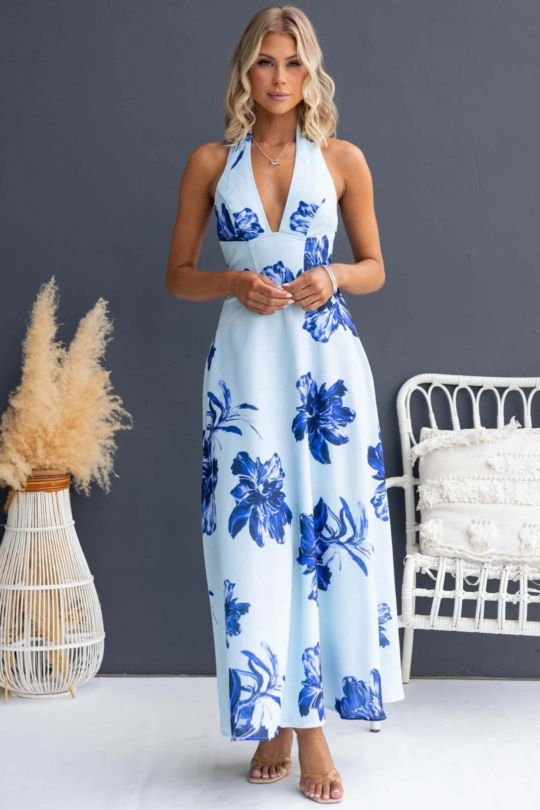 Ladies max dress with deep V-neckline and floral accents Lune London