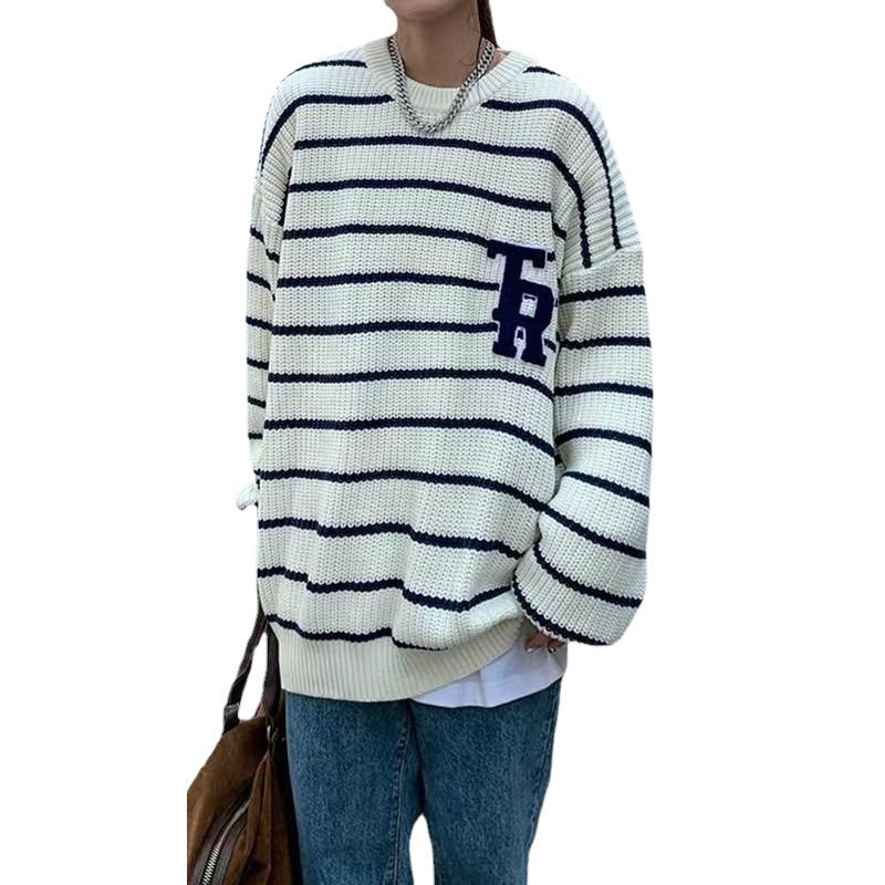 Casual oversized knit sweater for women with broken stripes and a chest pocket Lune London