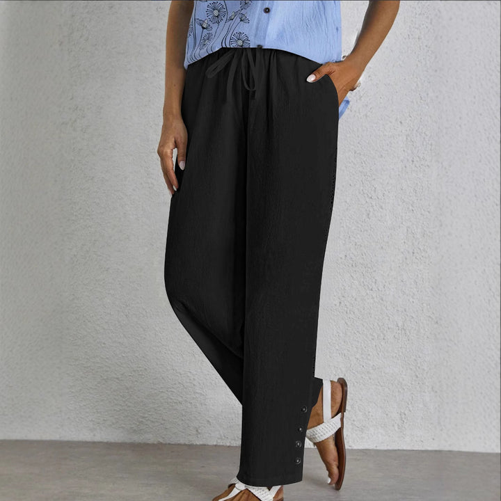 Oversized summer pants for women with elastic waistband and side button details Lune London