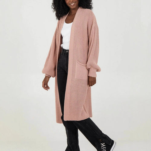 Plus size knitted cardigan for women with voluminous sleeves and an opening at the front Lune Londonl