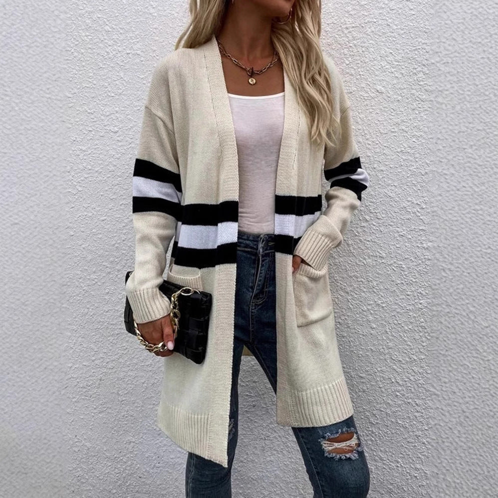 Women Open Knit Sweater with a Modern Striped Pattern and Practical Pockets Lune London
