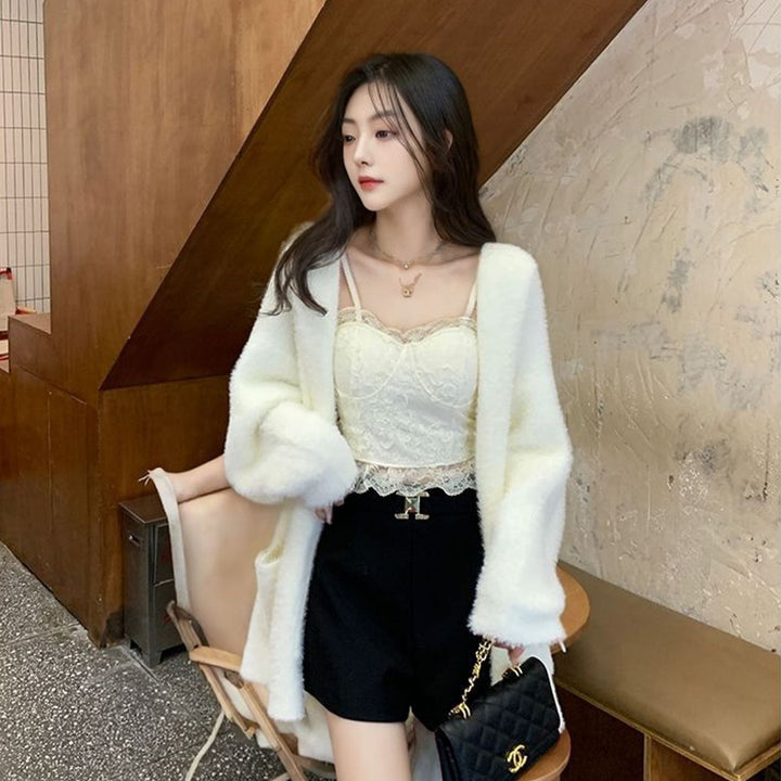Cardigan en maille duveteuse pour femme avec poches décontractées et coupe ouverte Chic & Stil