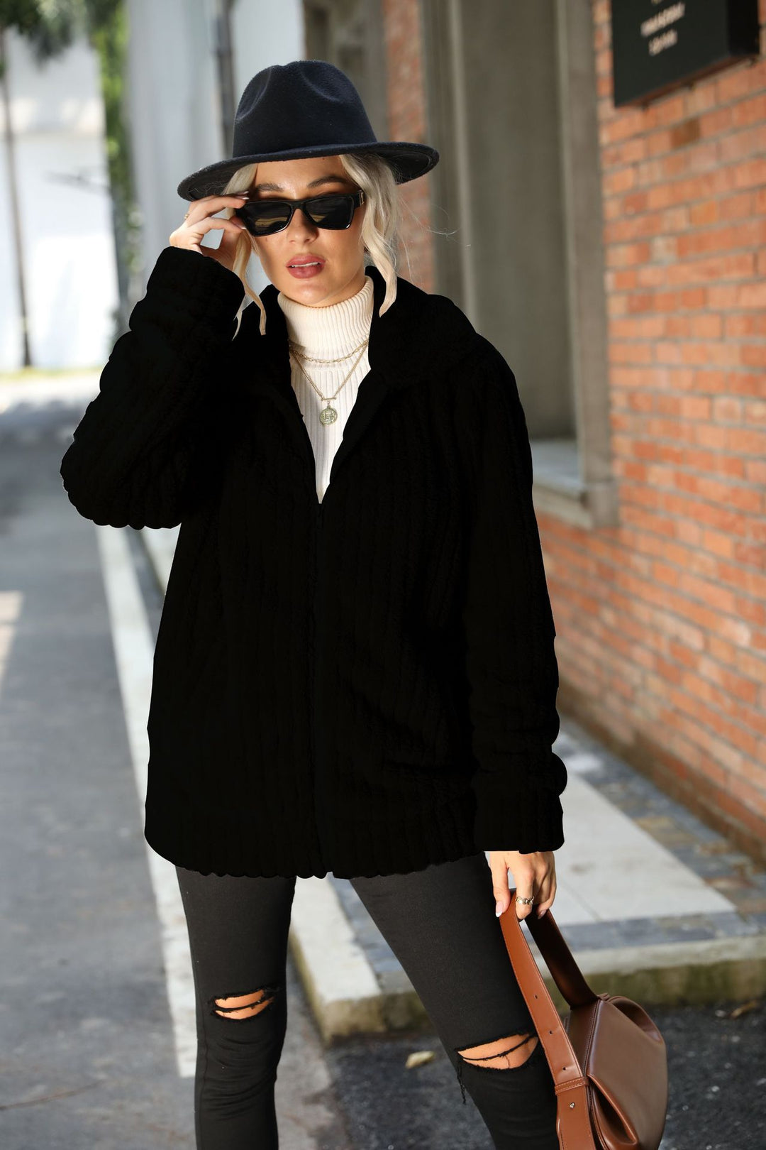 Soft fleece jacket for women with a soft collar and practical zippered pockets Lune London