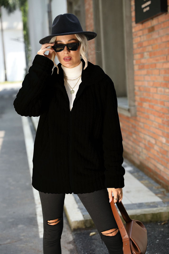 Soft fleece jacket for women with a soft collar and practical zippered pockets Lune London