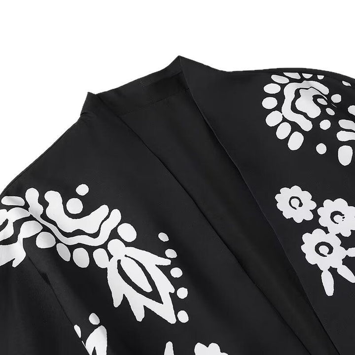 Ladies trendy kimono jacket with floral patterns and belt at the waist Lune London