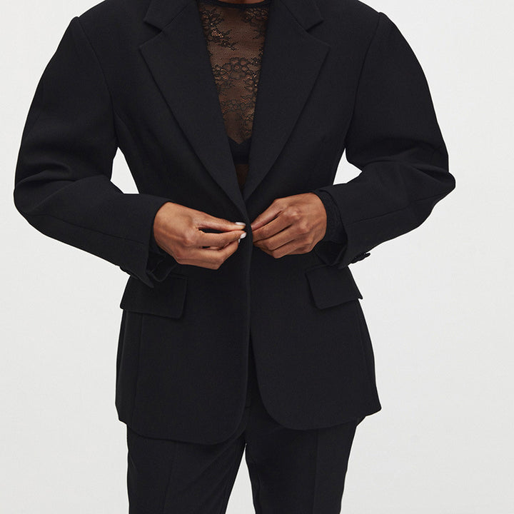 Oversized women's blazer jacket with unique button details and a relaxed fit Lune London
