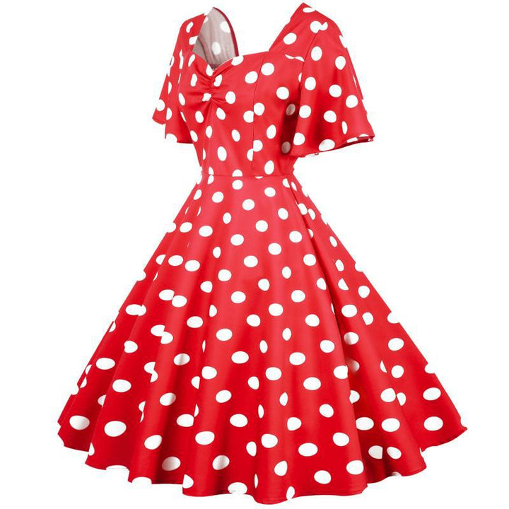 Robe Rockabilly pour femmes avec un motif amusant à pois et un ourlet flottant Chic & Stil