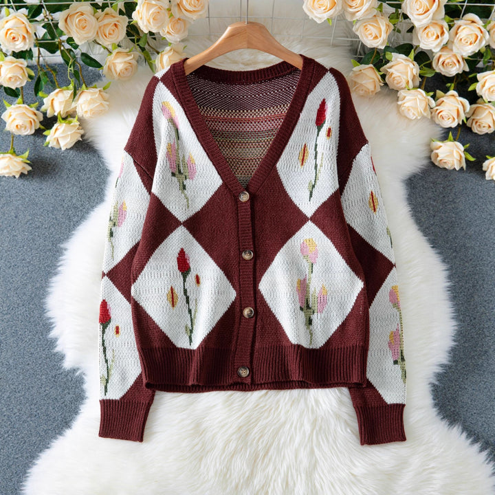 Women's knit jacket with floral pattern and decorative button design Lune London