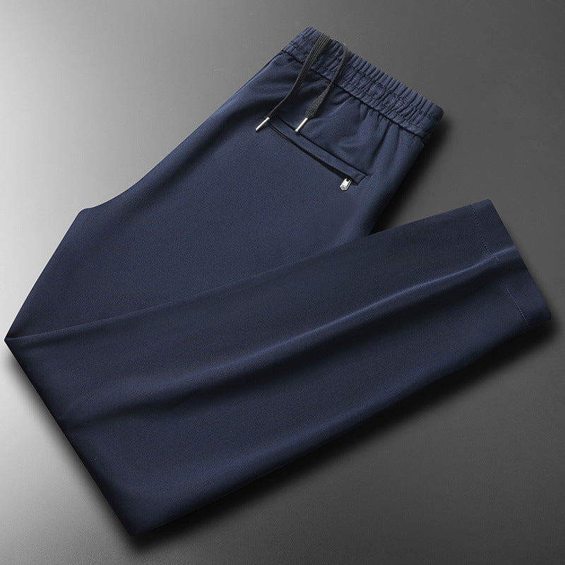 Versatile men's sports pants with elastic waistband and functional pockets Lune London