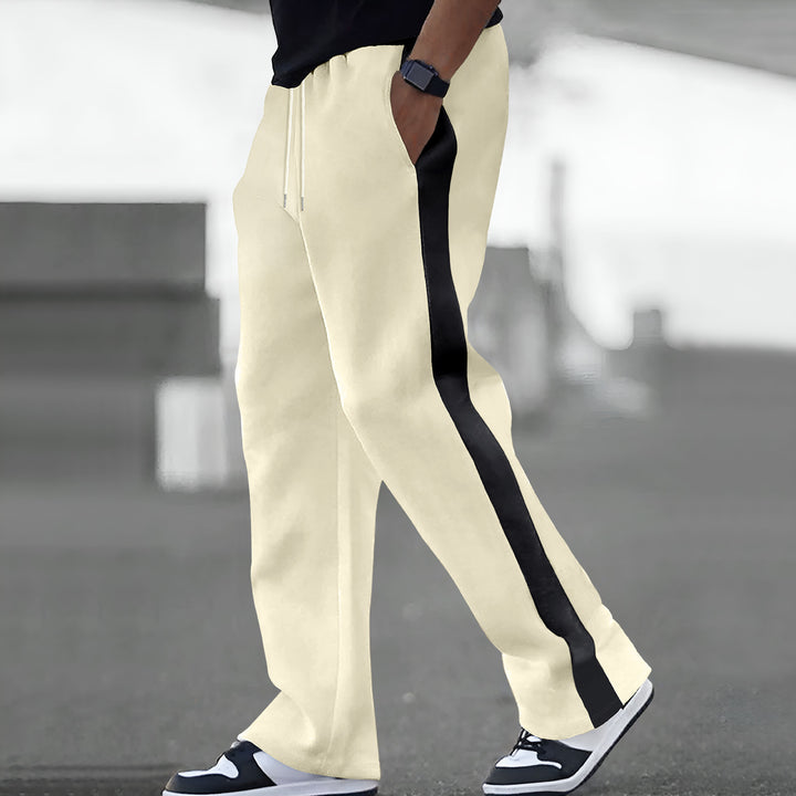 Trendy sports pants for men with elastic waistband and contrasting side stripes Lune London
