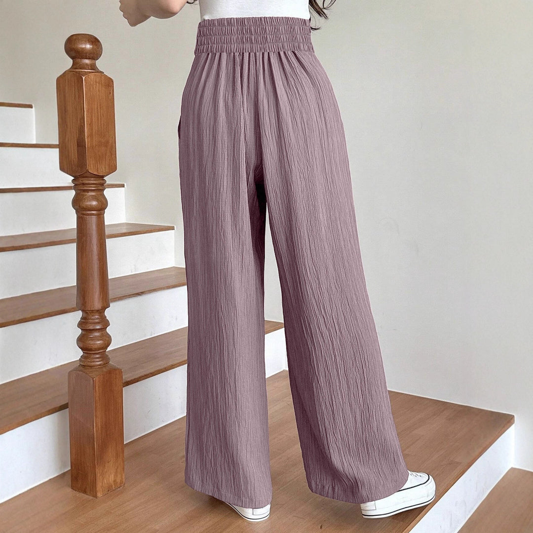 Wide pleated trousers for women with high pockets and elastic waist Lune London