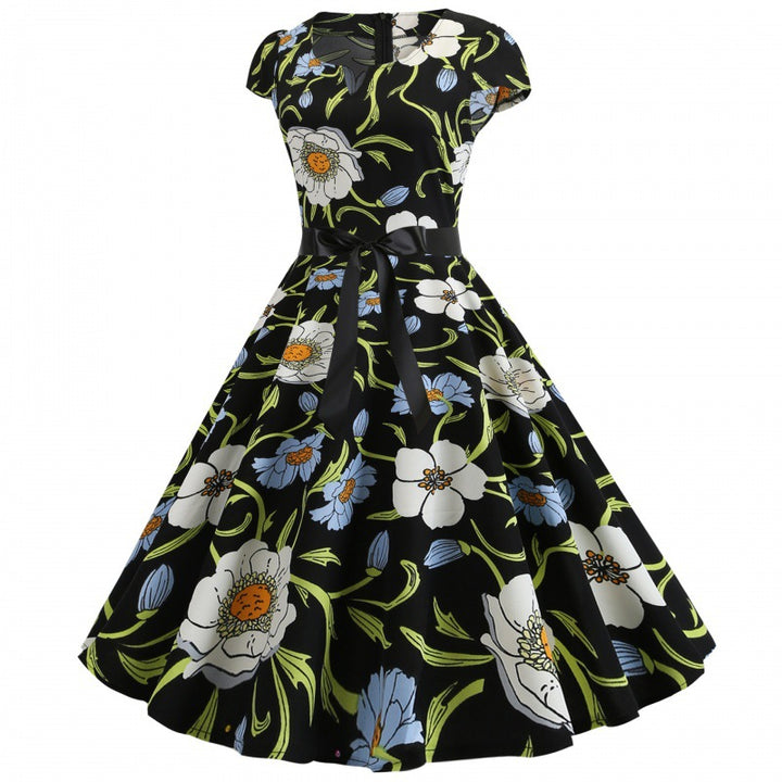 Robe swing pour femmes avec motif floral et taille élégante Chic & Stil