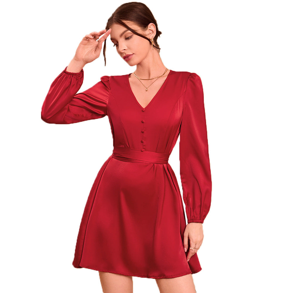 Robe midi élégante pour femmes avec décolleté en V et manches bouffantes Chic & Stil