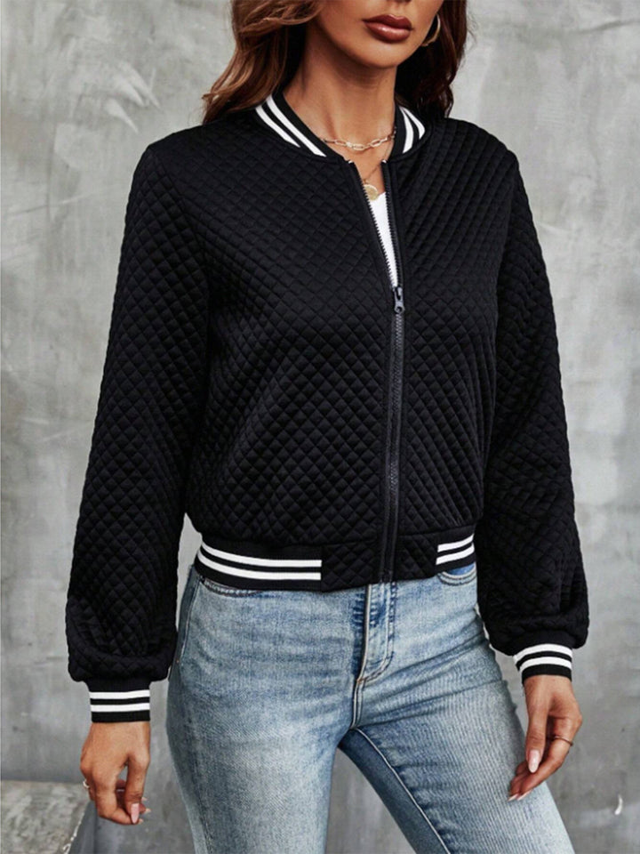Veste matelassée femme au design sportif avec des manches contrastées Chic & Stil