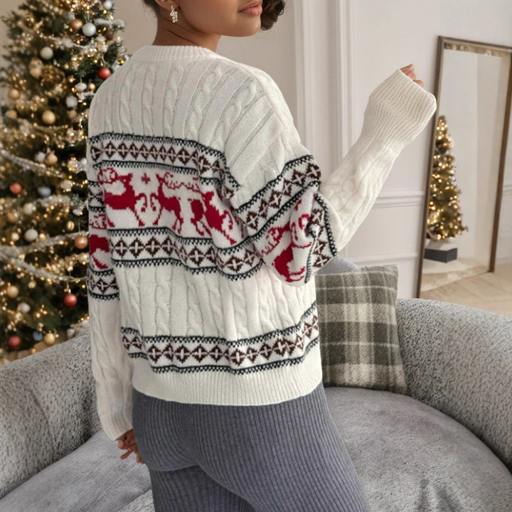 Knitted sweater for women with festive reindeer pattern and luxurious cable pattern Lune London