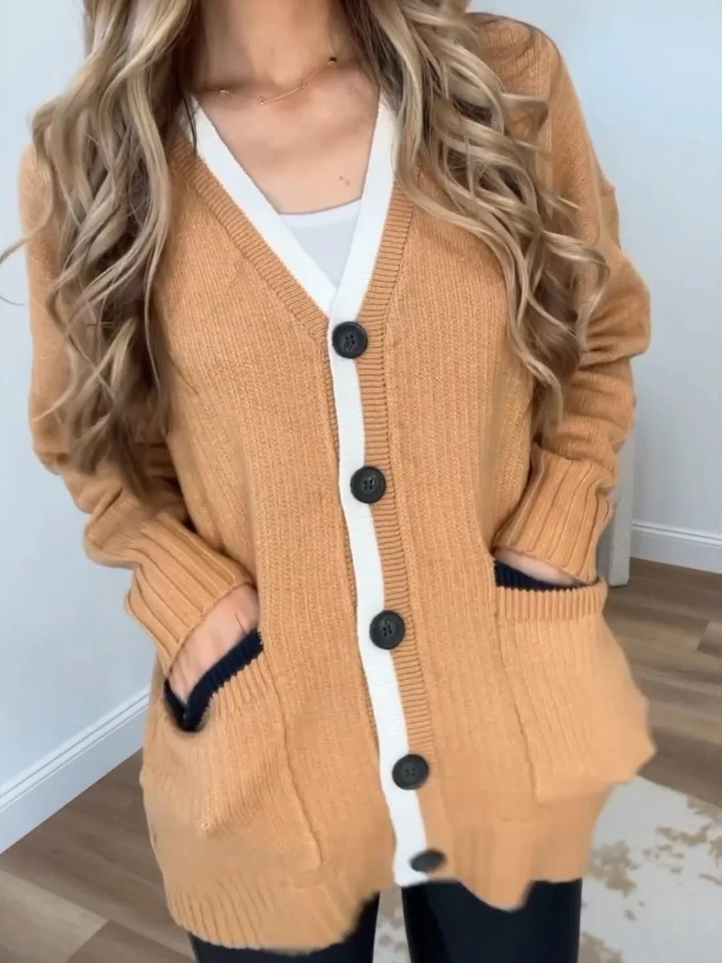 Women's knitted jacket with pockets and modern buttons Lune London