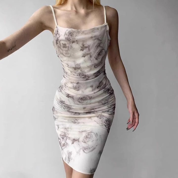 Maxi fitted dress for women with refined ruffles and a floral pattern Lune London