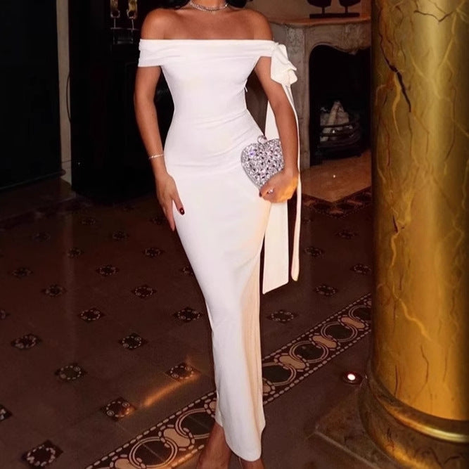 Elegant off-shoulder maxi dress for women with a sculpting fit and a flowing hem Lune London