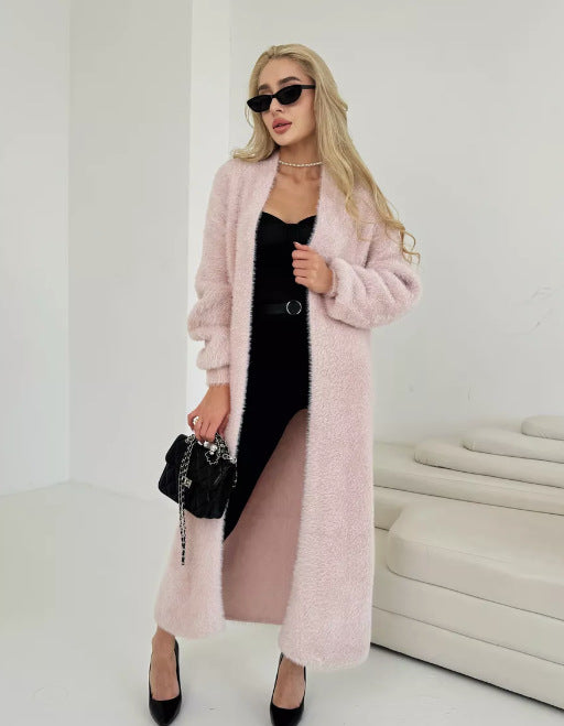 Cardigan long en peluche pour femmes au design élégant avec des ouvertures et des matériaux doux Chic & Stil