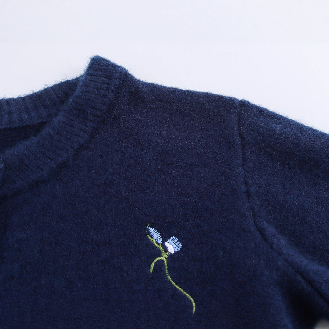 Knitted women's jacket with embroidered floral design and decorative buttons Lune London