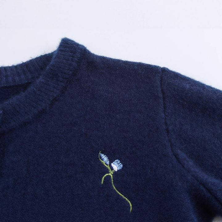 Knitted women's jacket with embroidered floral design and decorative buttons Lune London