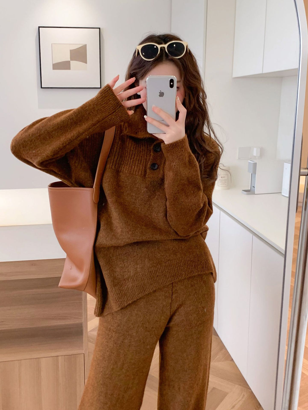 Comfortable knitted sweater for women with a high collar and button details Lune London